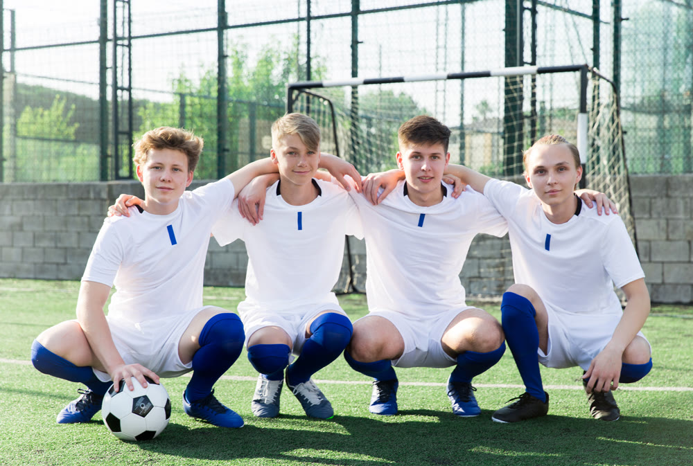 Group portrait of male soccer team