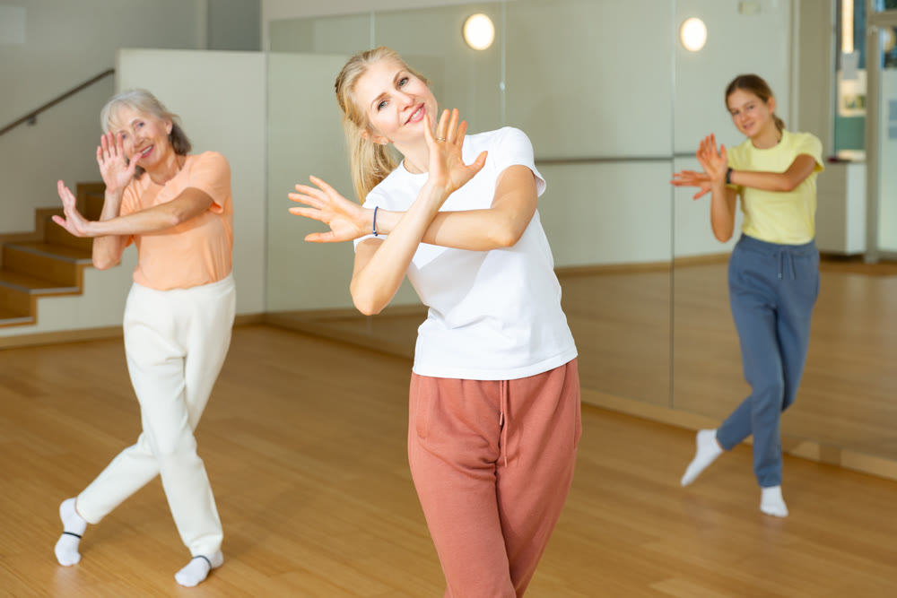 Group of women dancing modern dance
