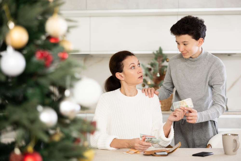 Boy asking mother for money