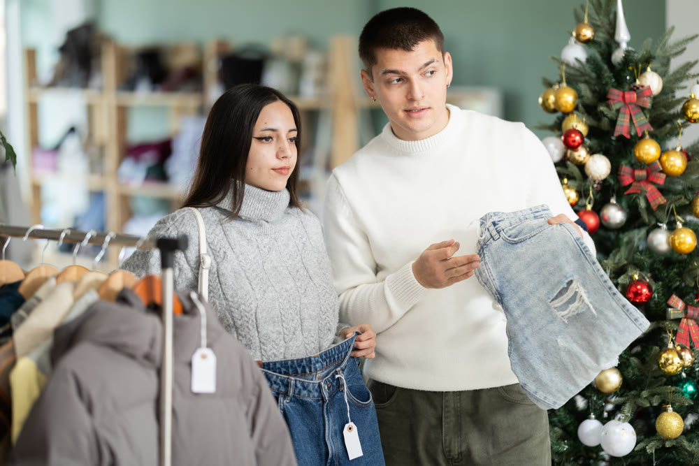 couple chooses jeans instead in a clothing store
