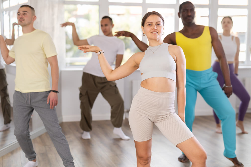 Group of people dancing modern dances