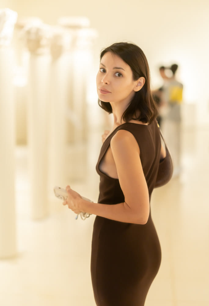 Young woman visiting a modern exhibition