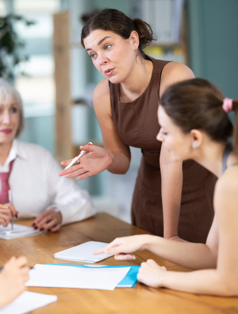 Female participate sit at circle, chatting, talking