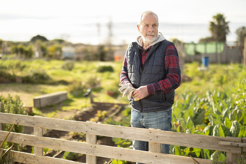 Eldery man while working in garden