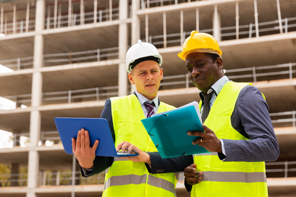 Engineers standing on construction site