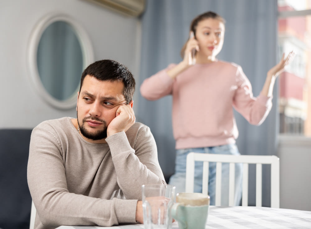 Young adult couple having problems in relationship
