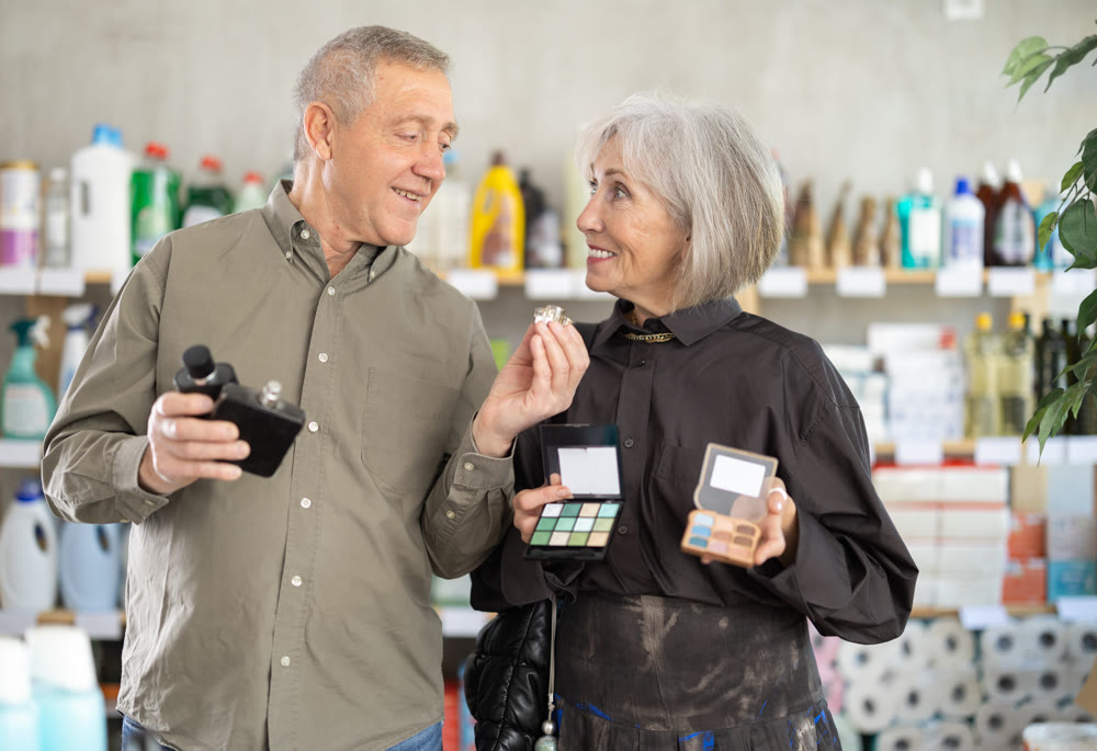 Husband and wife choose cosmetics and perfumes in the supermarket