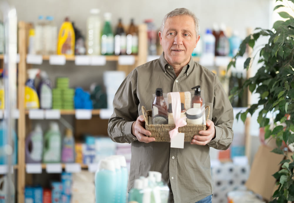 Elderly man choosing a bath gift set
