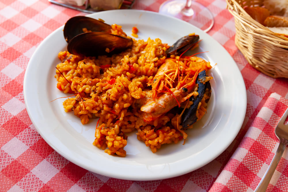 Seafood paella with shrimps and clams