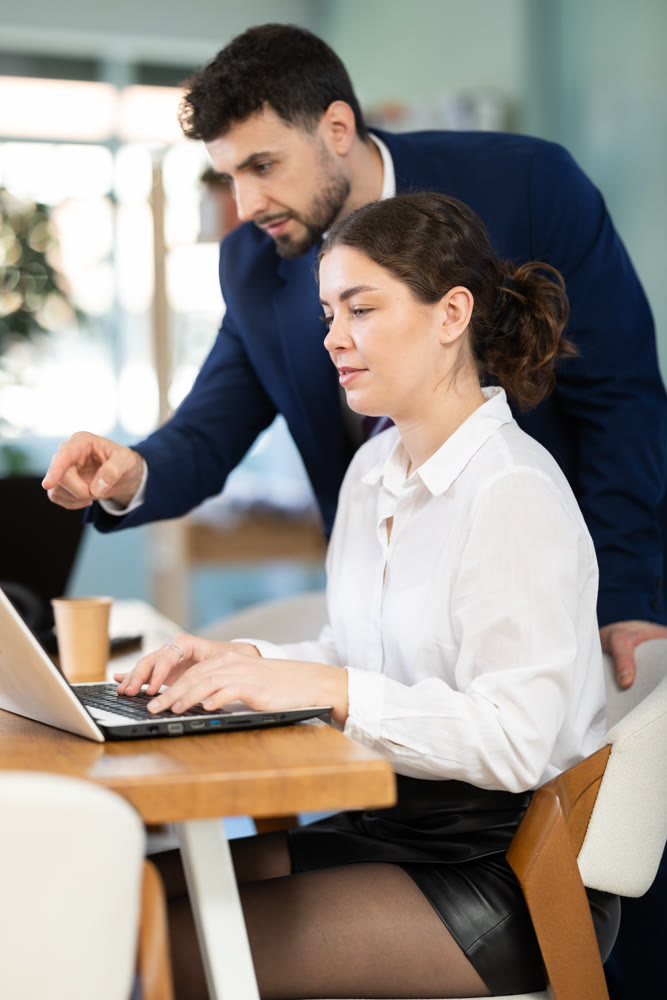 Employees working on the project in office