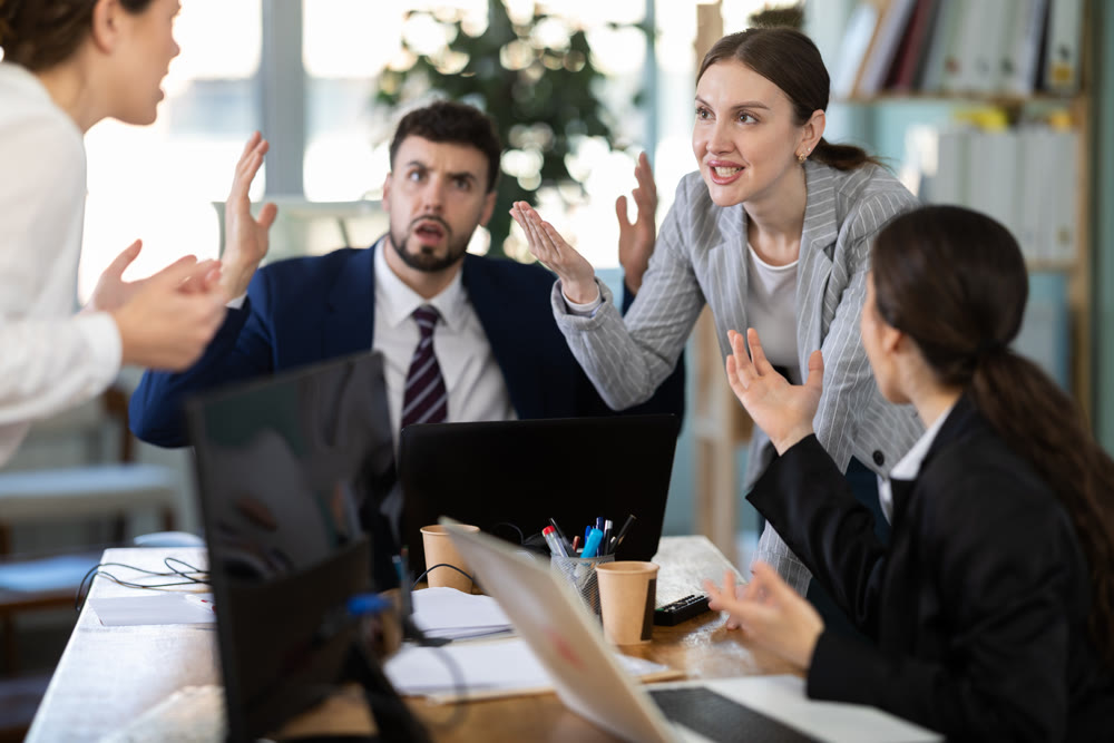 Team of employees got into an argument during an office meeting