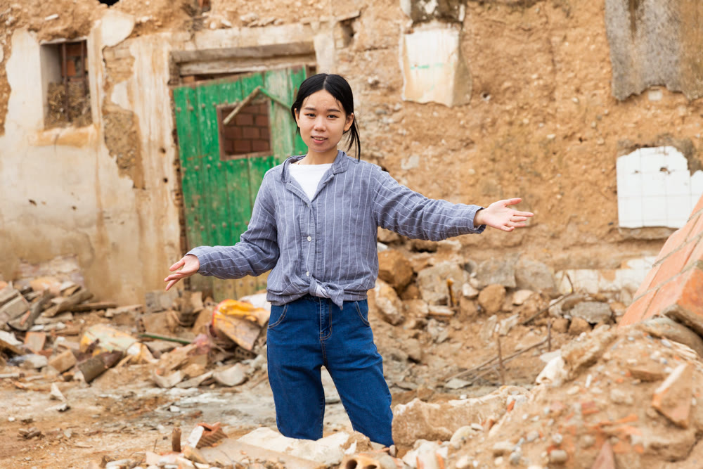 Chinese girl near building