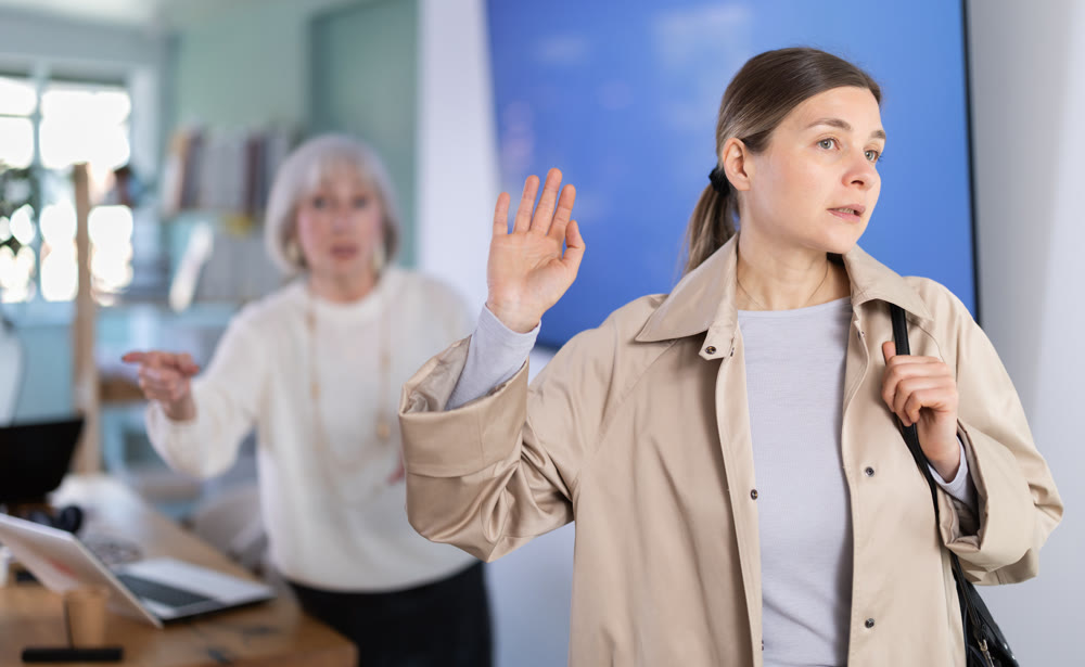 Dissatisfied female director of company throws female manager out of office