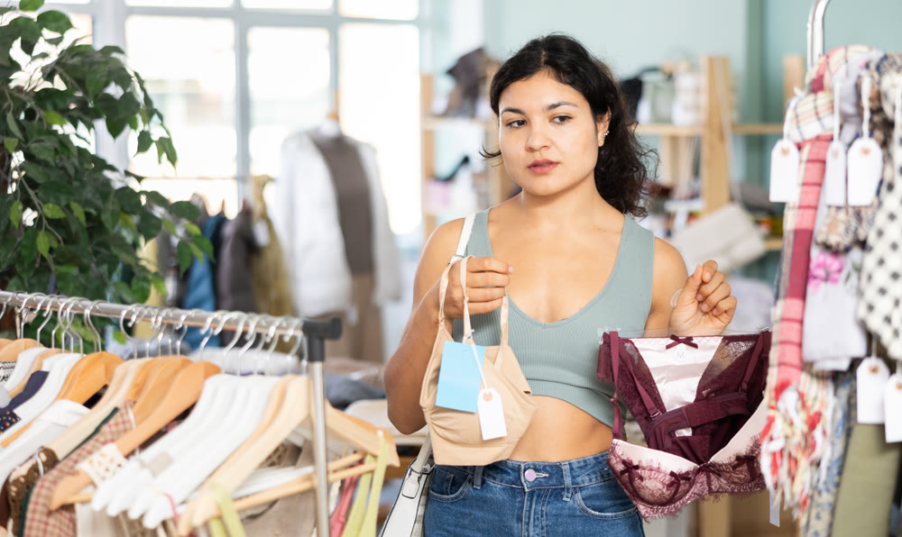 Girl at trading floor pick out and buying bra