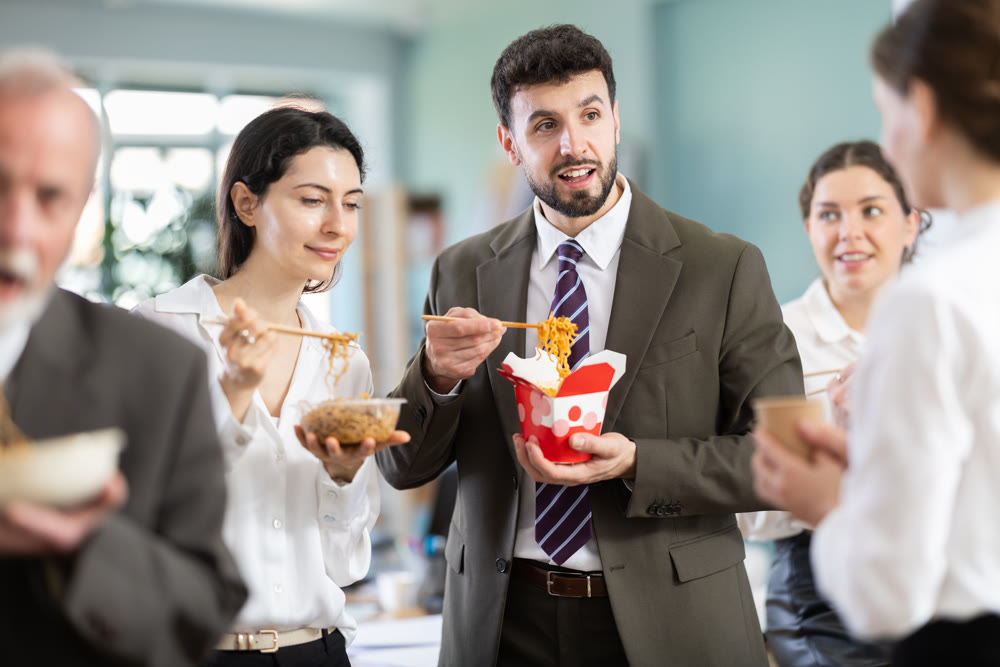 People eat Chinese noodles for lunch