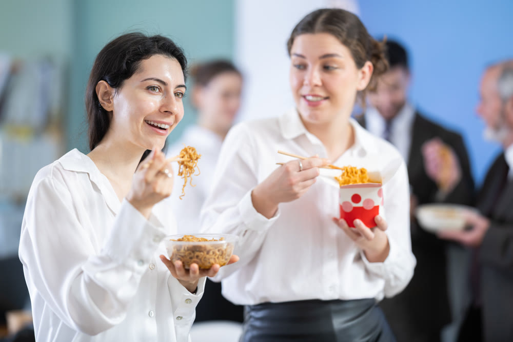 People eat Chinese noodles for lunch
