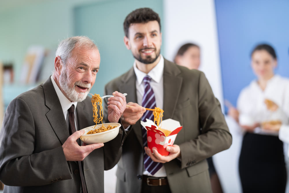 People eat Chinese noodles for lunch