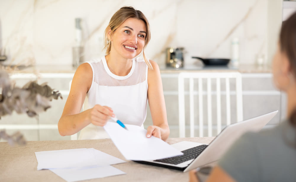 Girl meeting financial advisor for investment at his home