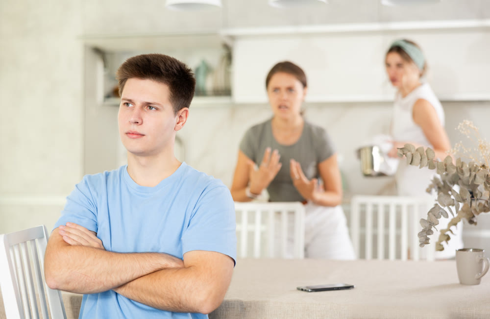 Quarrel of mom, girl and guy. Woman and young girl shouts at guy and accuses her