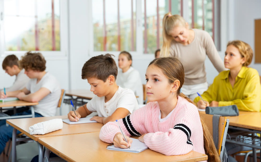 Portrait of schoolgirl at lesson in school