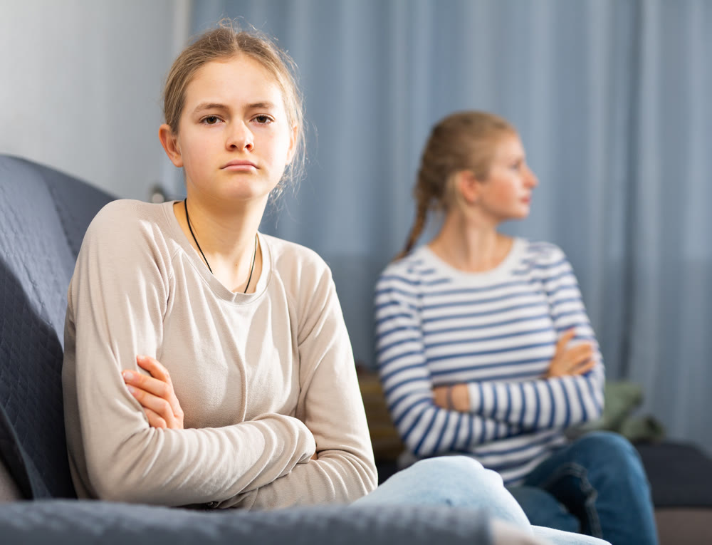 Portrait of upset teenager schoolgirl