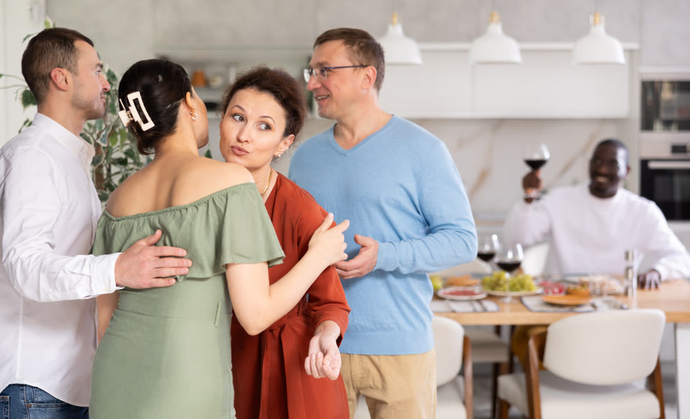 Group of friends greeting each other