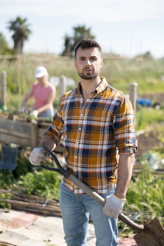 Portrait of male farmer during harvesting in field