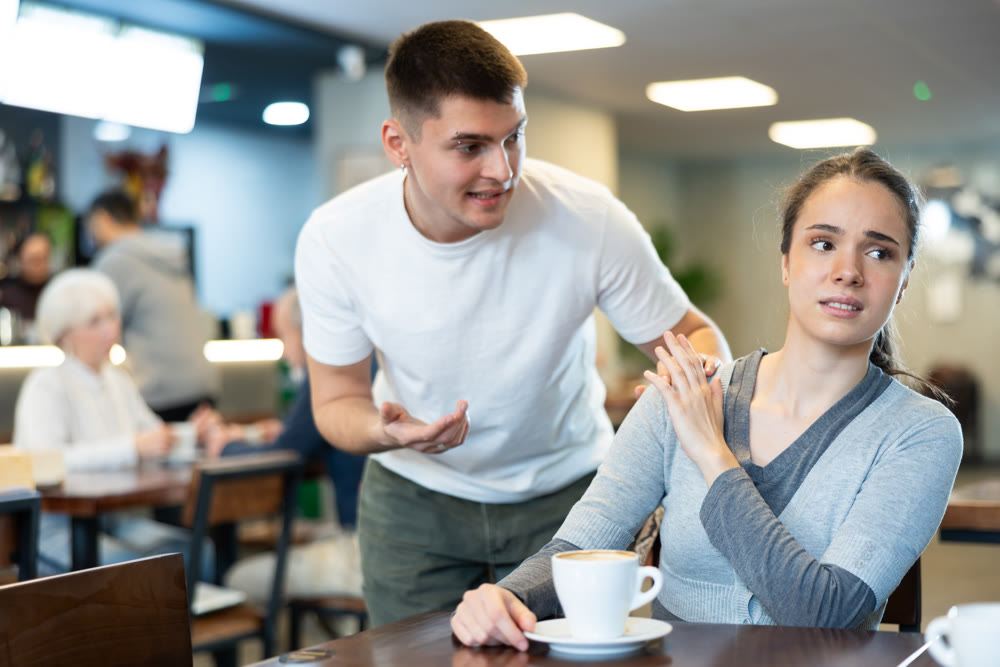 Girl rejects guy. Young man violates personal boundaries of girl