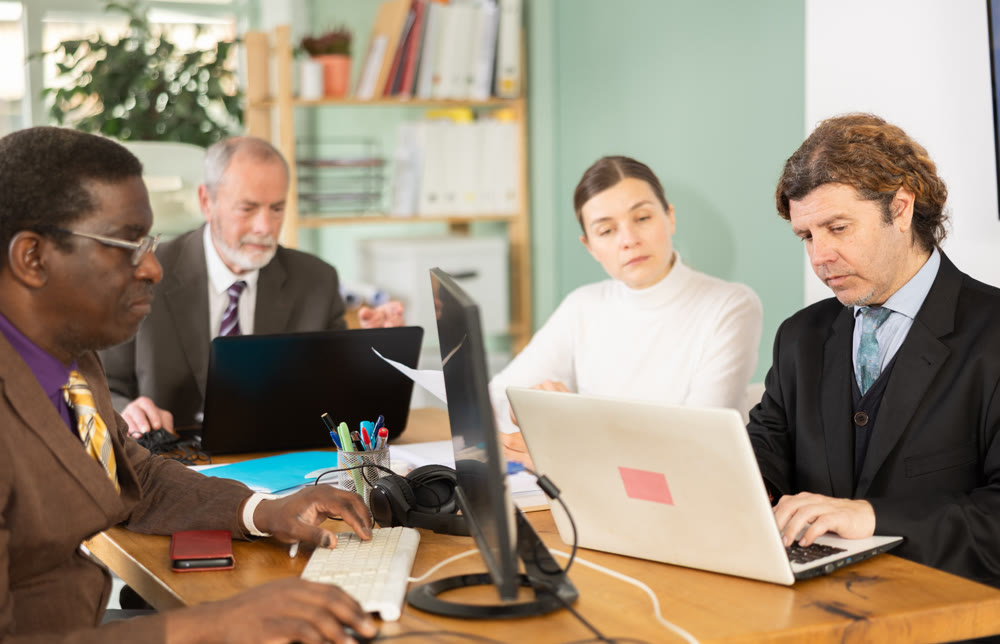 Employees work together in the office, they discuss everyday issues