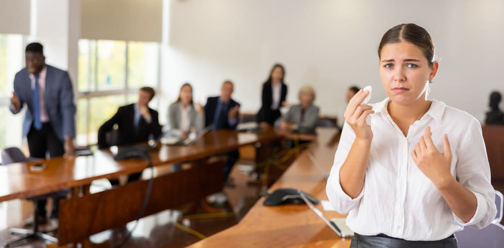 Devastated millennial white brunette female worker being fired