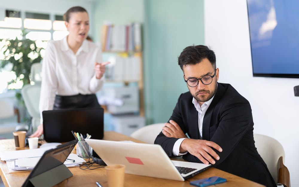 Female manager is dissatisfied with work of an employee - yells and reproaches her