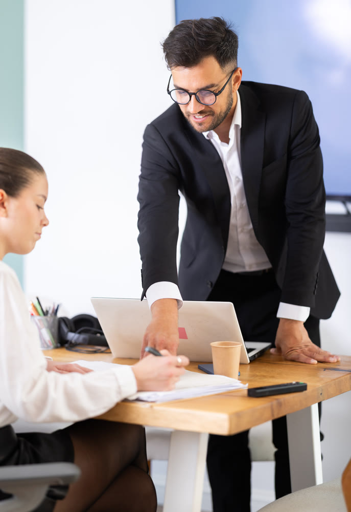 professionals working in a successful company, sit at a table