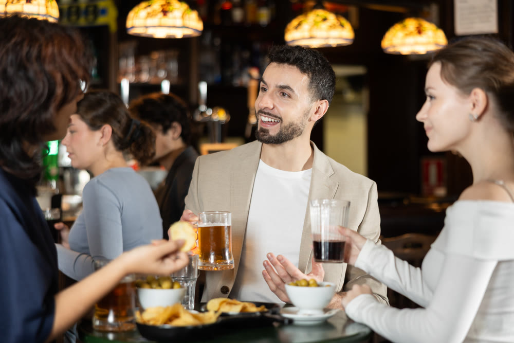Young people spend time at bar