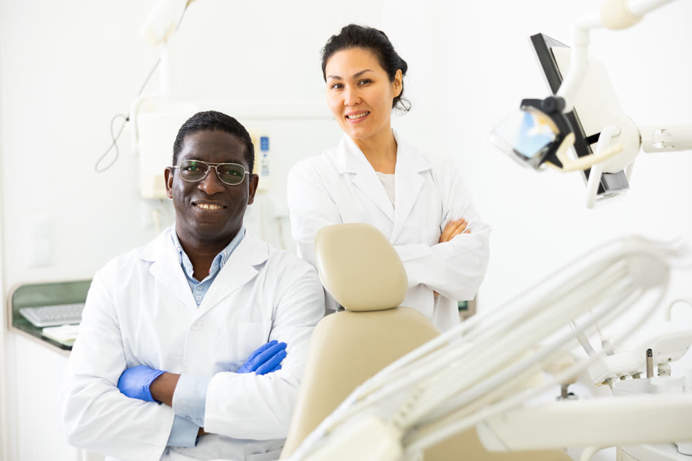 Portrait of doctor and a nurse in dental office