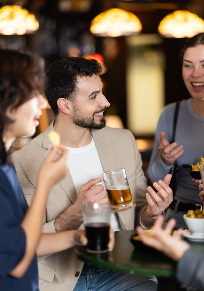Young people spend time at bar