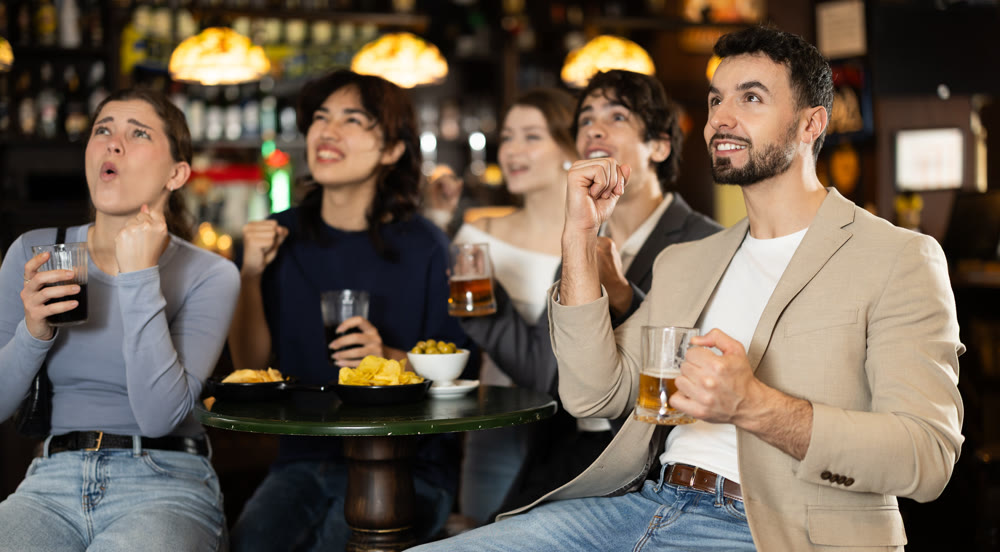 Sports fans react with delight to changes in lucky game