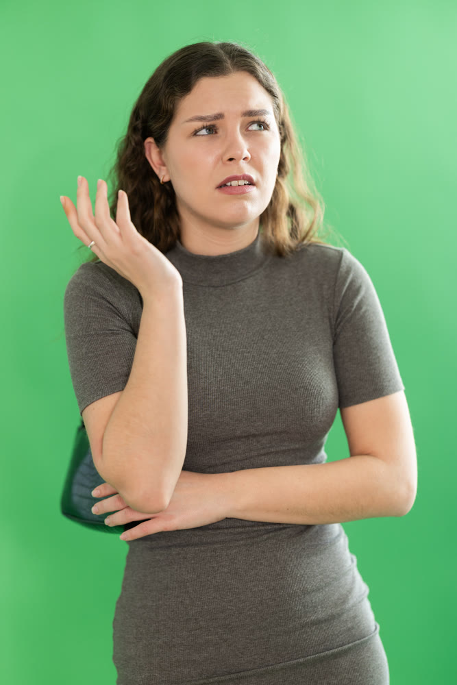 Sad girl is upset about problems that have arisen. Chroma key compositing