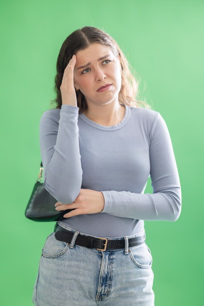 Sad girl is upset about problems that have arisen. Chroma key compositing