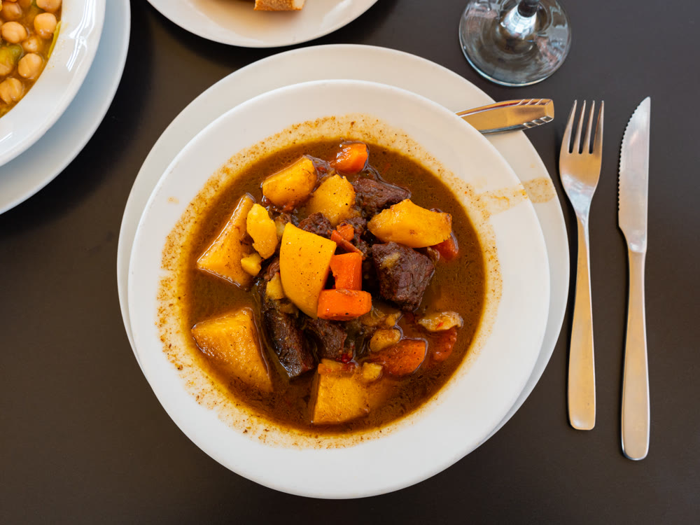 Fricando de ternera - this is traditional Catalan dish consisting of meat stewed in rich sauce with mushrooms
