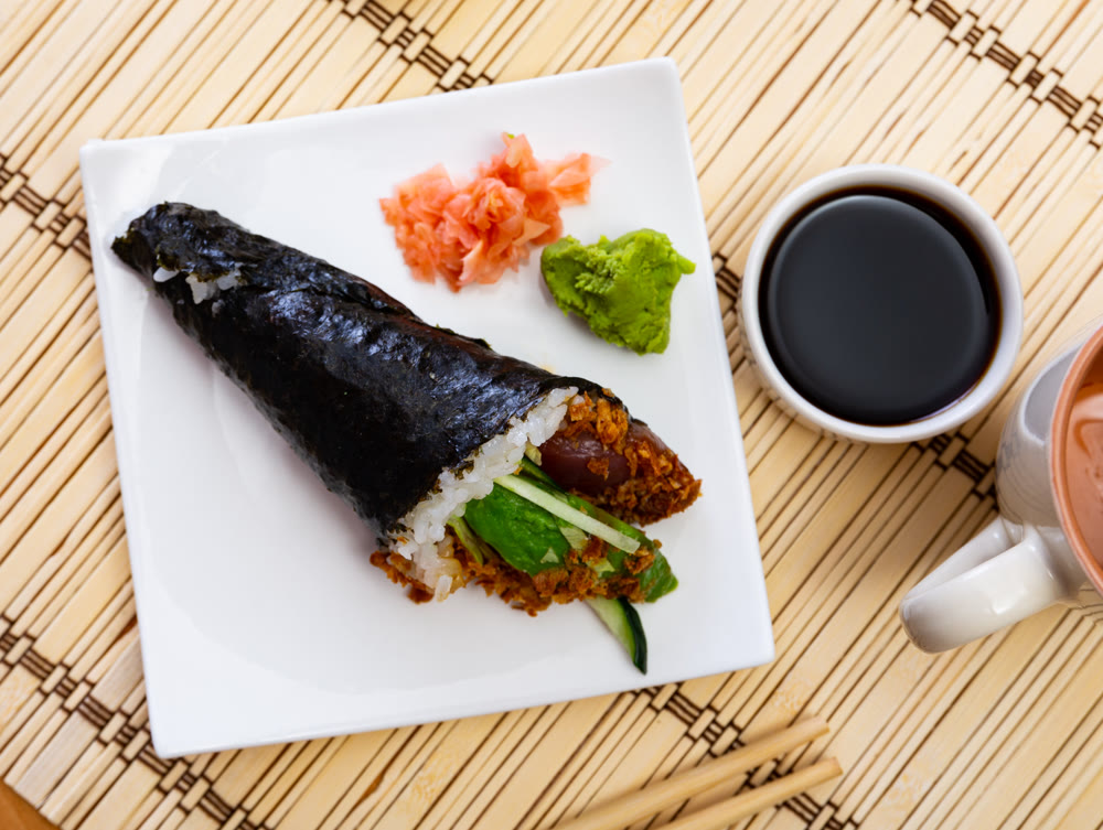Maguro temaki - these are rolls made of rice wrapped in nori seaweed, with tuna, lettuce, cucumber, avocado, onions