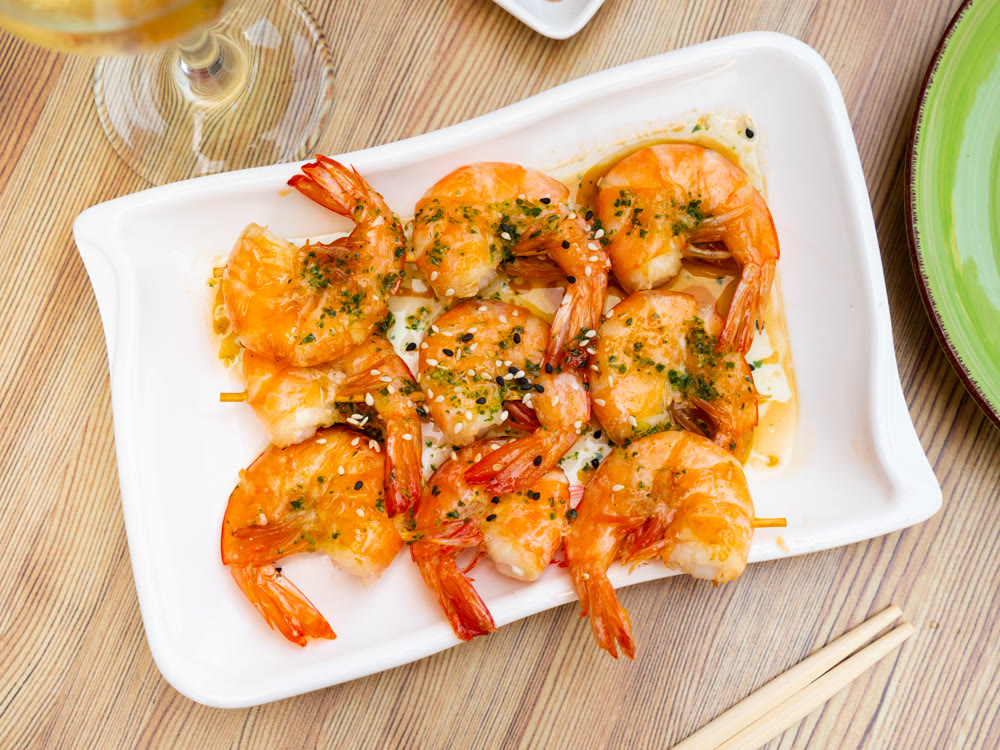 Shrimp cooked on skewers with spices