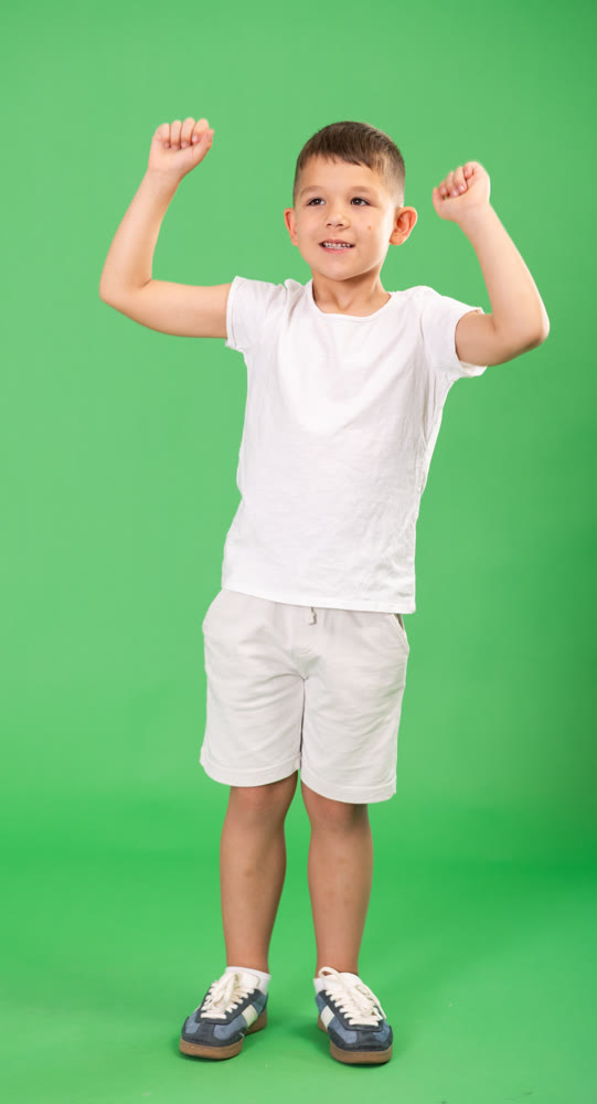 European child boy is genuinely happy and jubilant