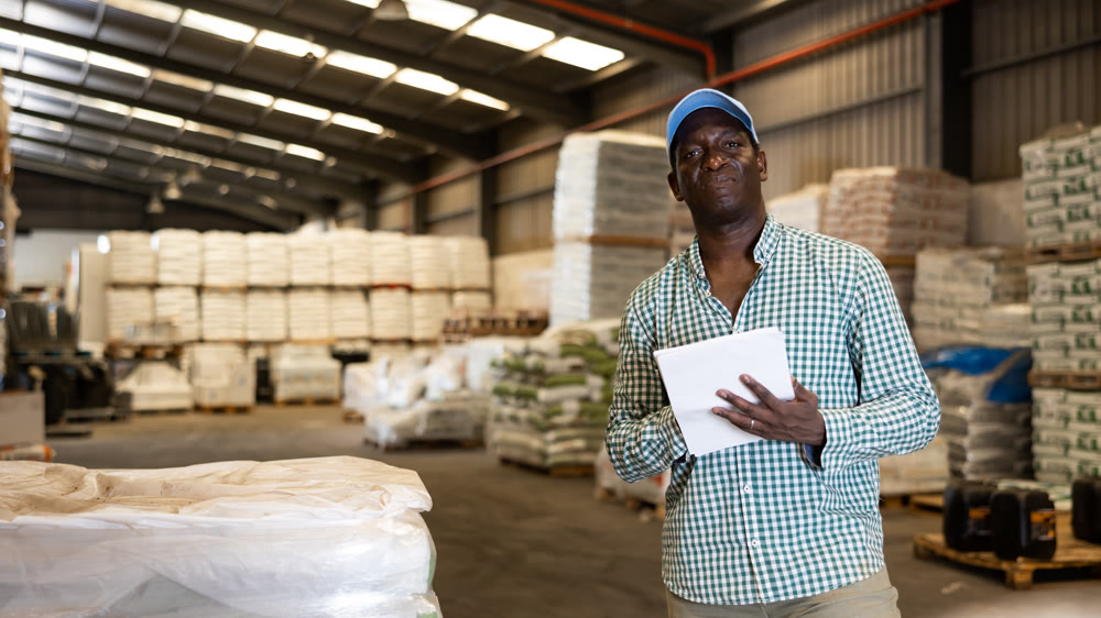 Portrait of man construction material storage worker