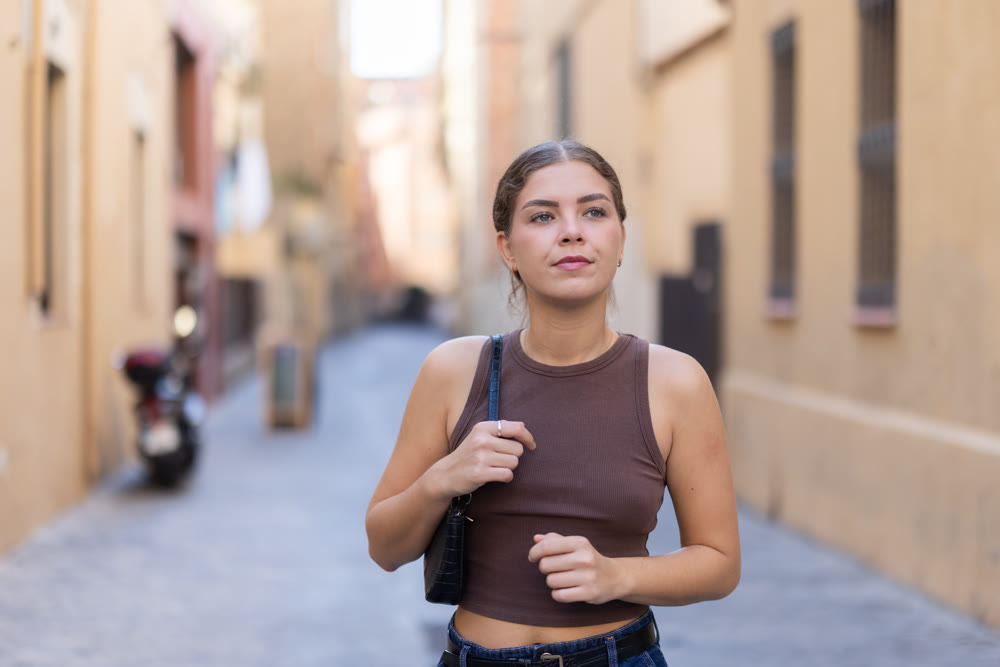 Girl walks around city district