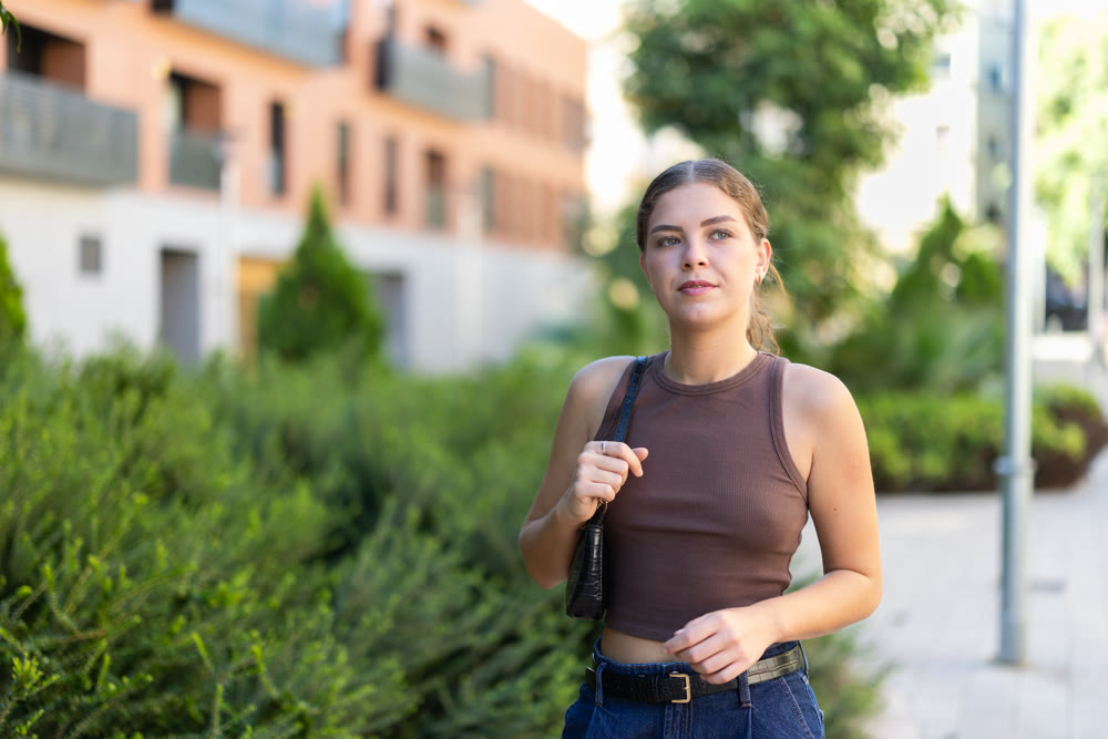 Girl walks around city district