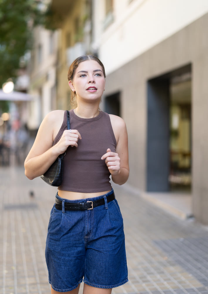 Girl walks around city district