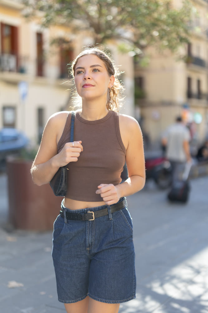 Girl walks around city district