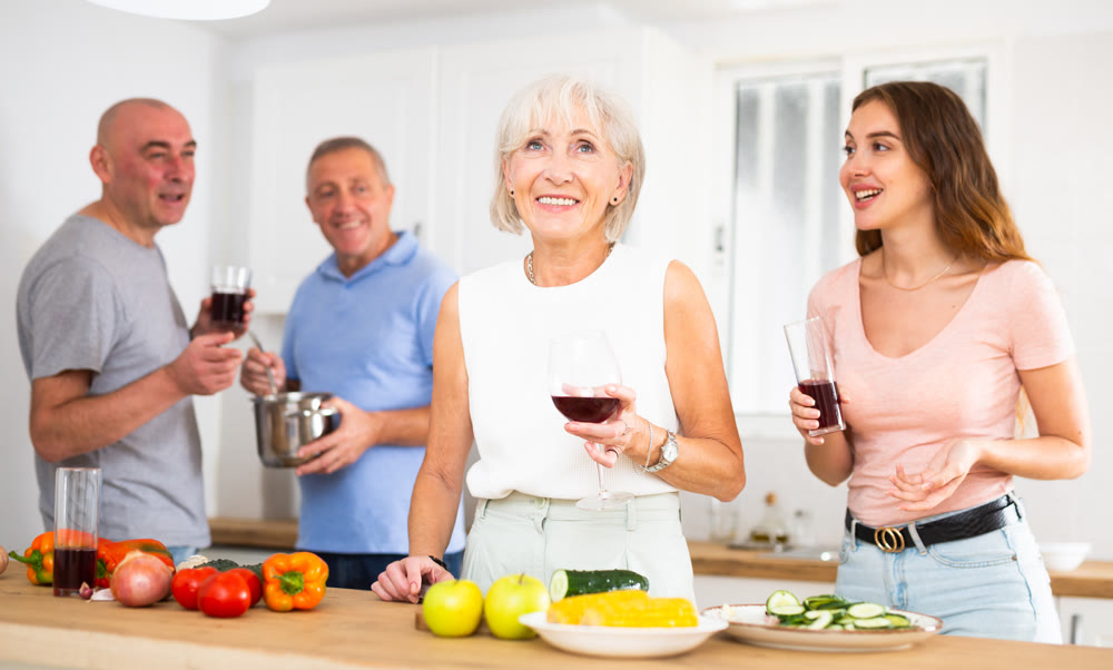 Happy family is preparing a festive dinner in the kitchen