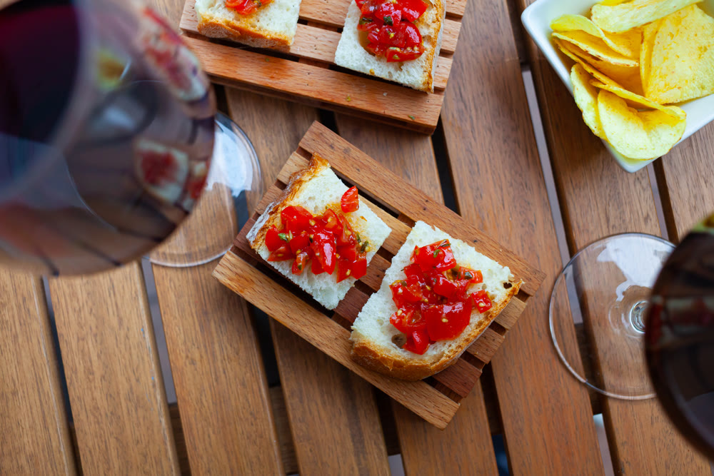 Dish of Italian cuisine - bruschetta with tomatoes