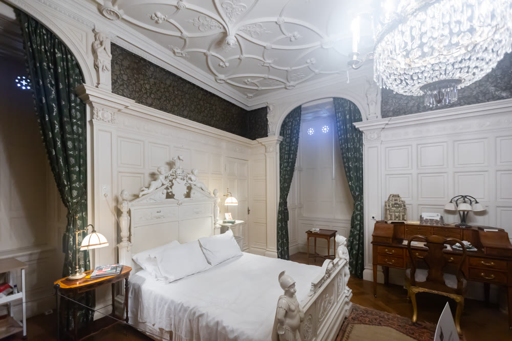 Luxurious white guest bedroom in De Haar Castle, Utrecht, Netherlands